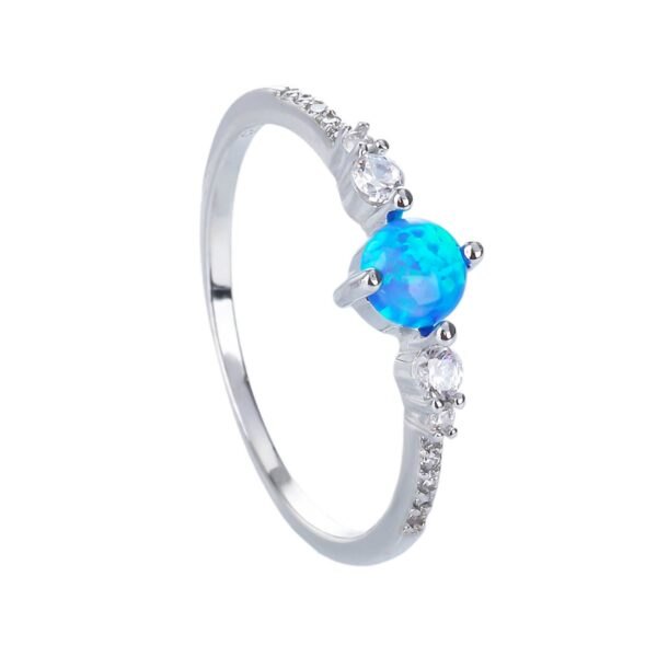 Stříbrný prsten SOLITÉR modrý OPÁL Velikost prstenu: 55